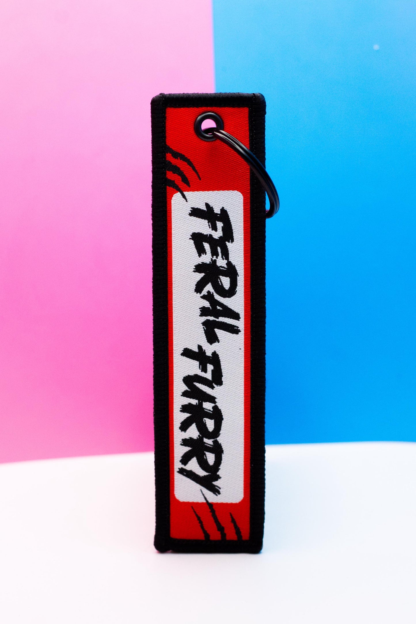 Feral Furry Embroidered Jet Tag | 5 Inch Woven Double Sided Keychain