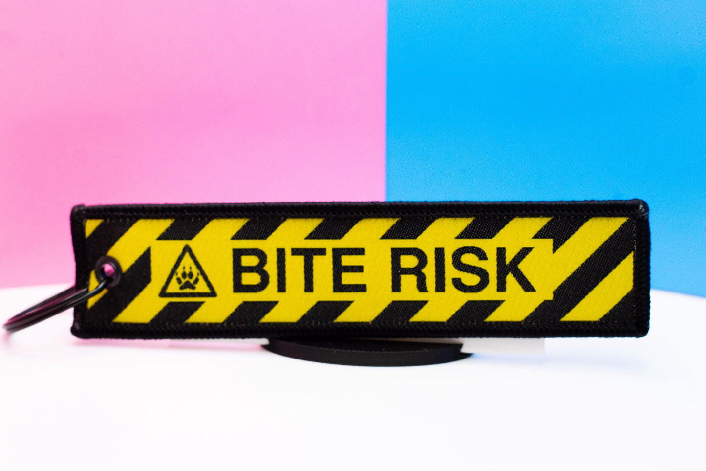 Bite Risk Embroidered Jet Tag | 5 Inch Woven Double Sided Keychain