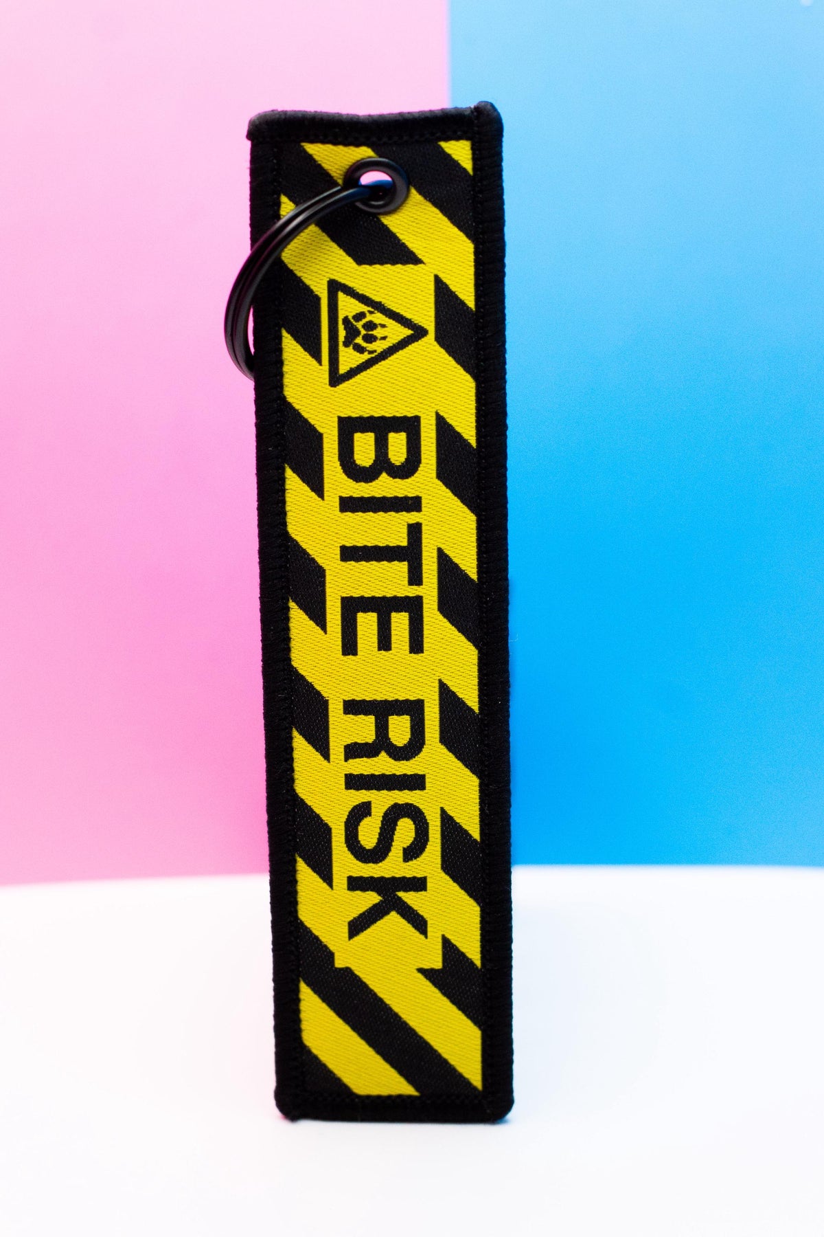 Bite Risk Embroidered Jet Tag | 5 Inch Woven Double Sided Keychain